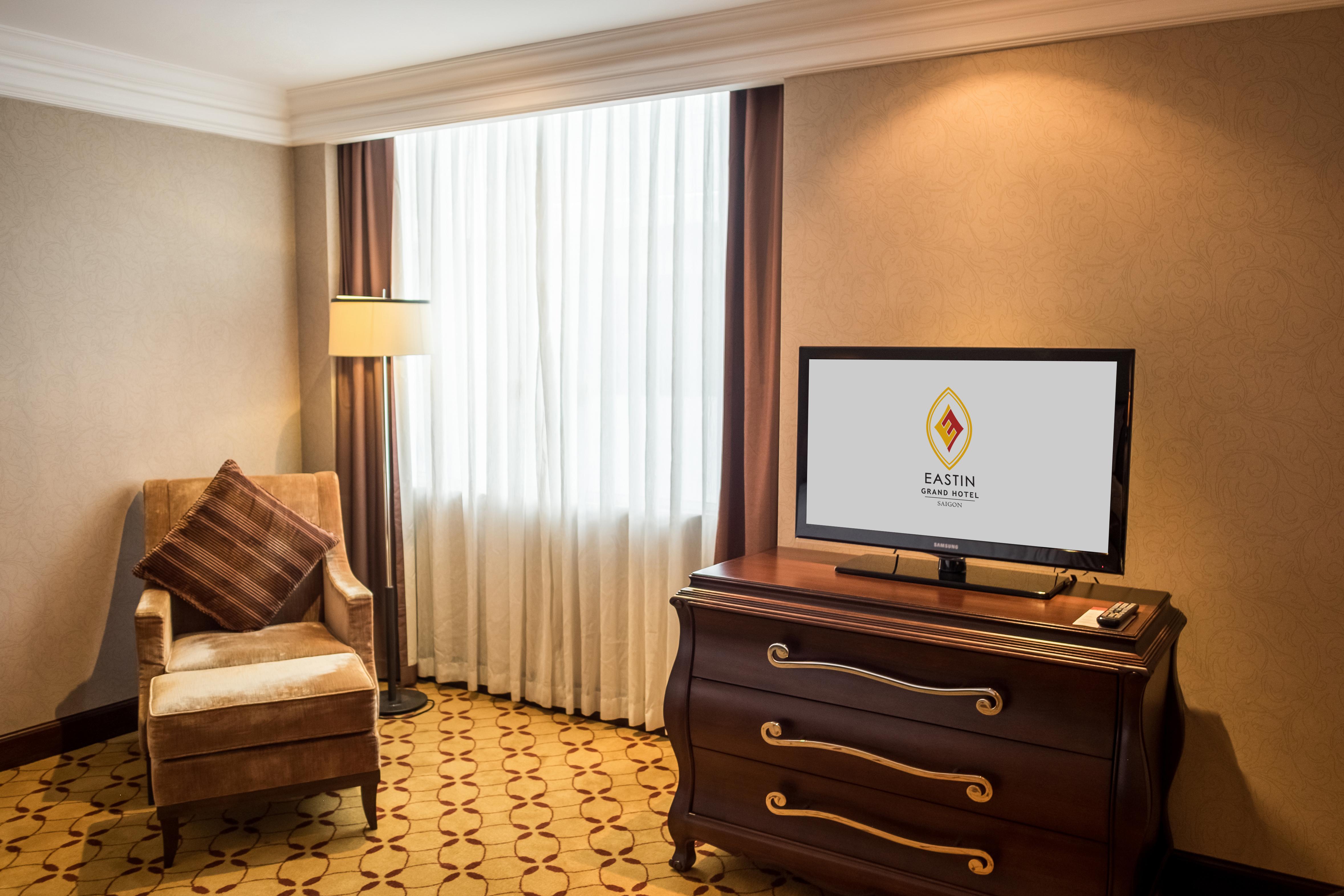 Eastin Grand Hotel Saigon Ho Chi Minh City Exterior photo A television in a hotel room