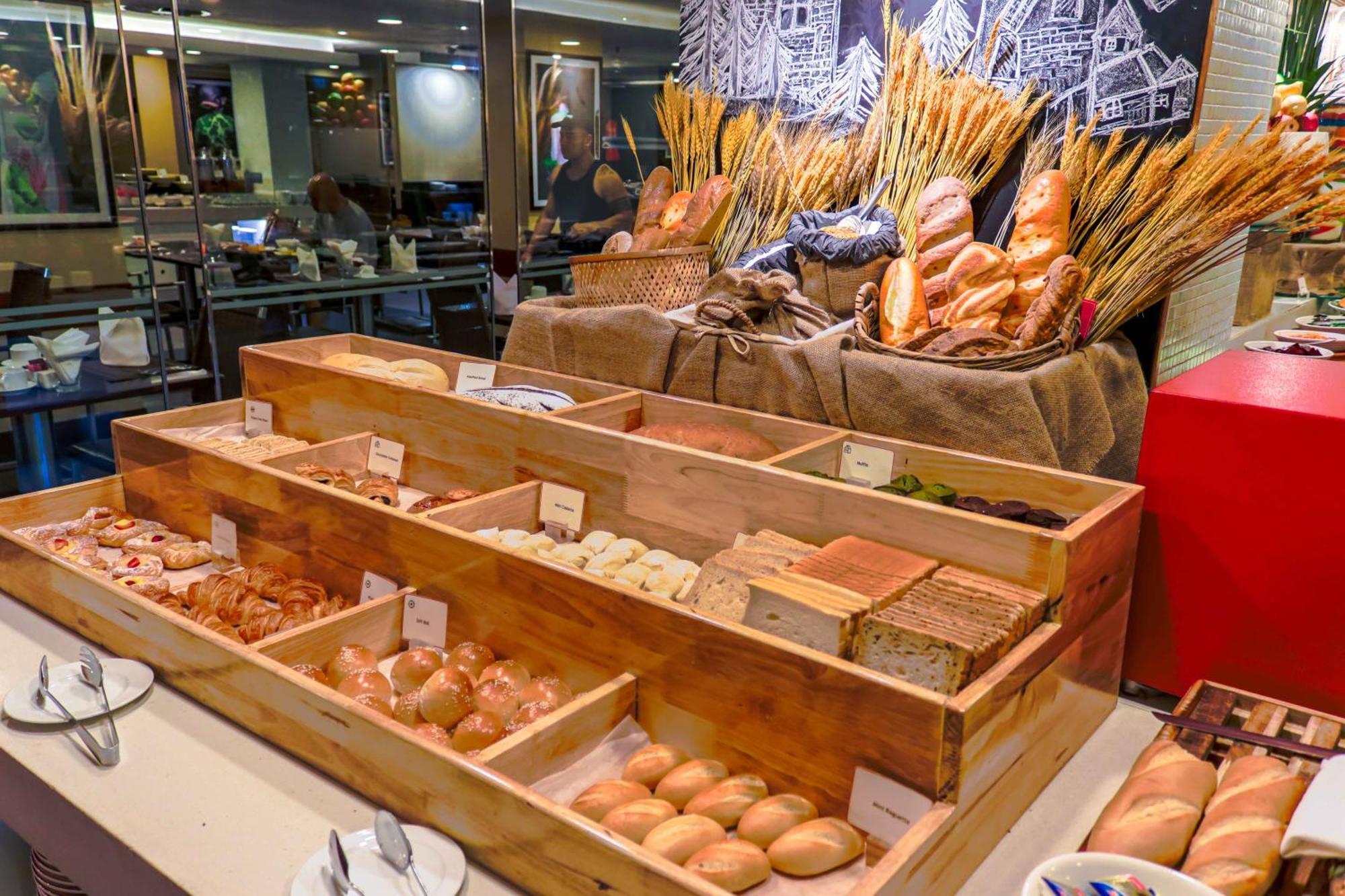 Eastin Grand Hotel Saigon Ho Chi Minh City Exterior photo Bread and pastry at a buffet