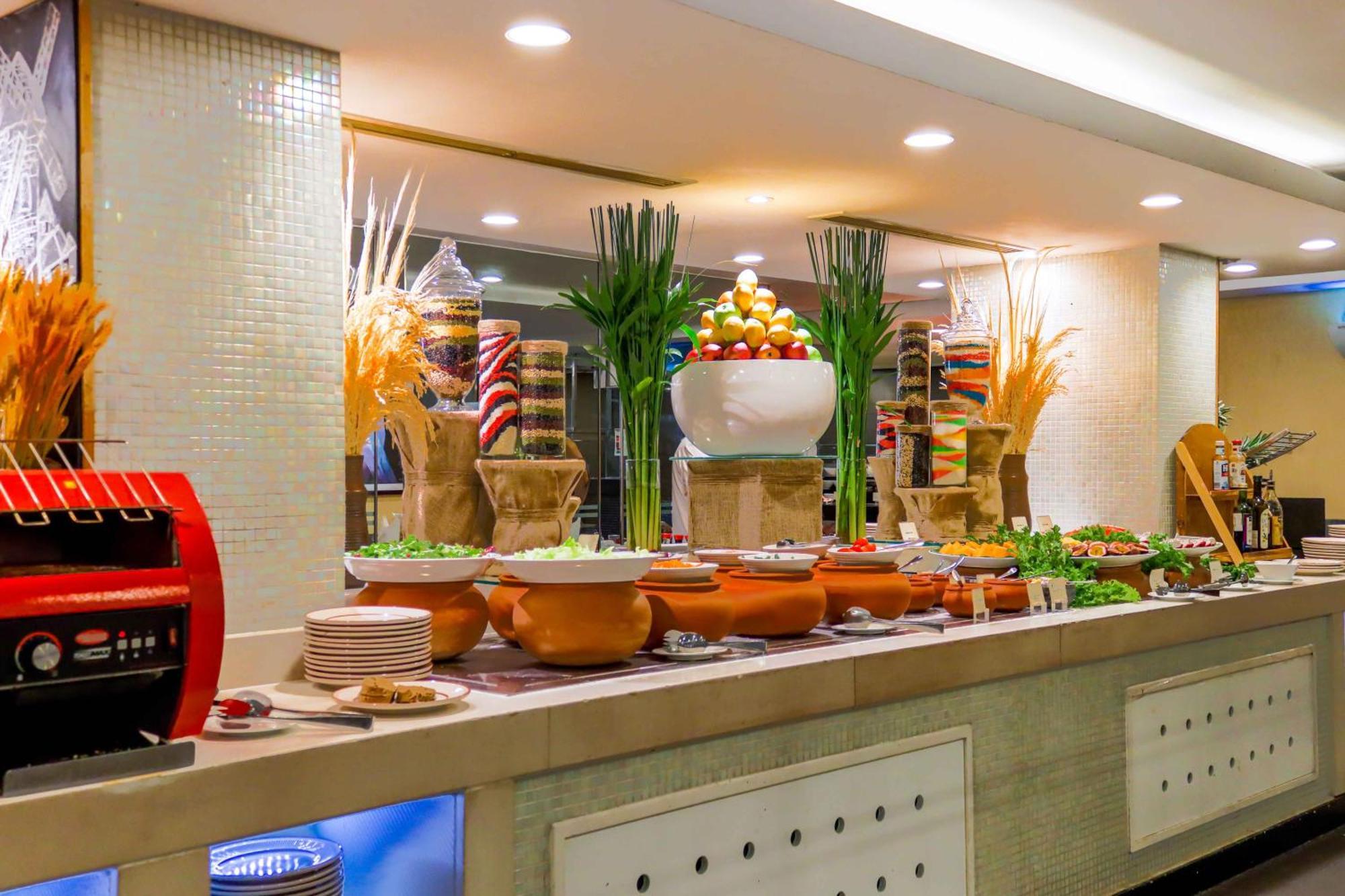 Eastin Grand Hotel Saigon Ho Chi Minh City Exterior photo A buffet at a hotel